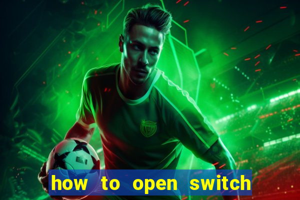 how to open switch oled game card slot